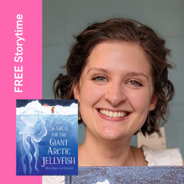 A white woman with short dark hair smiling at the camera, with a children's book.
